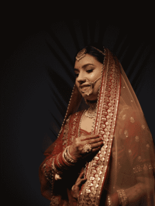 bridal look in a red lehanga captured by raipur wedding photographer